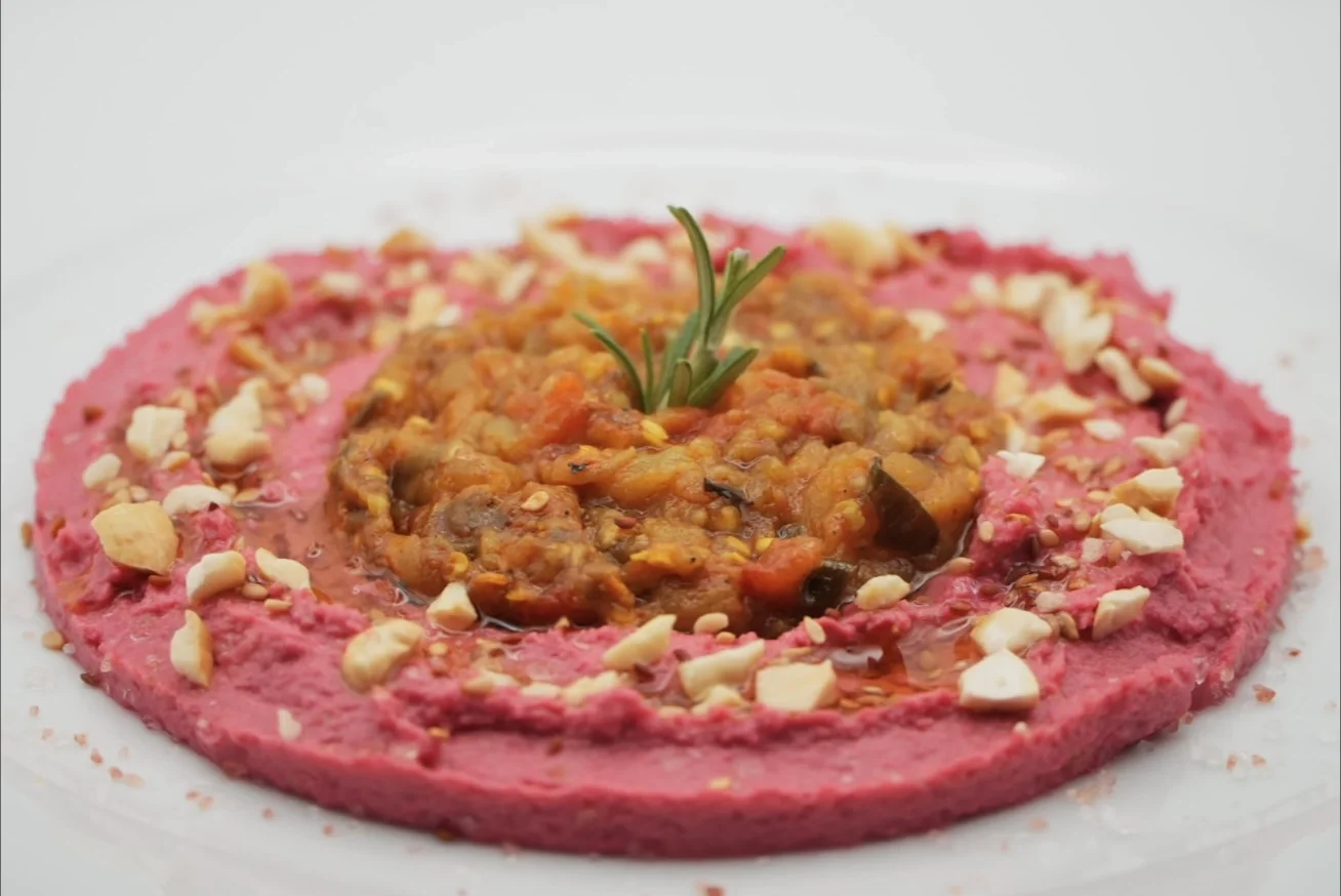 Zalouk with pink hummus and cashews